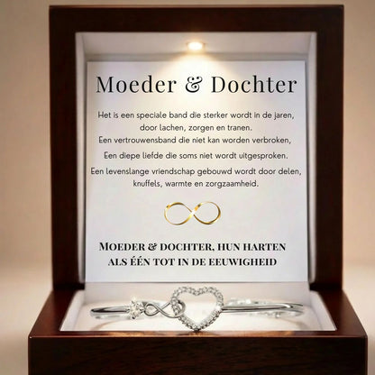 Infinity armband in zilver - detail hartbedeltje