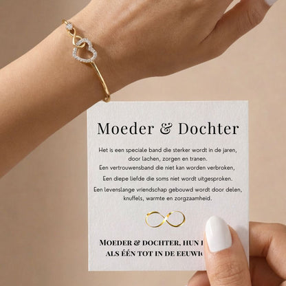 Infinity armband goud - detail hartbedeltje