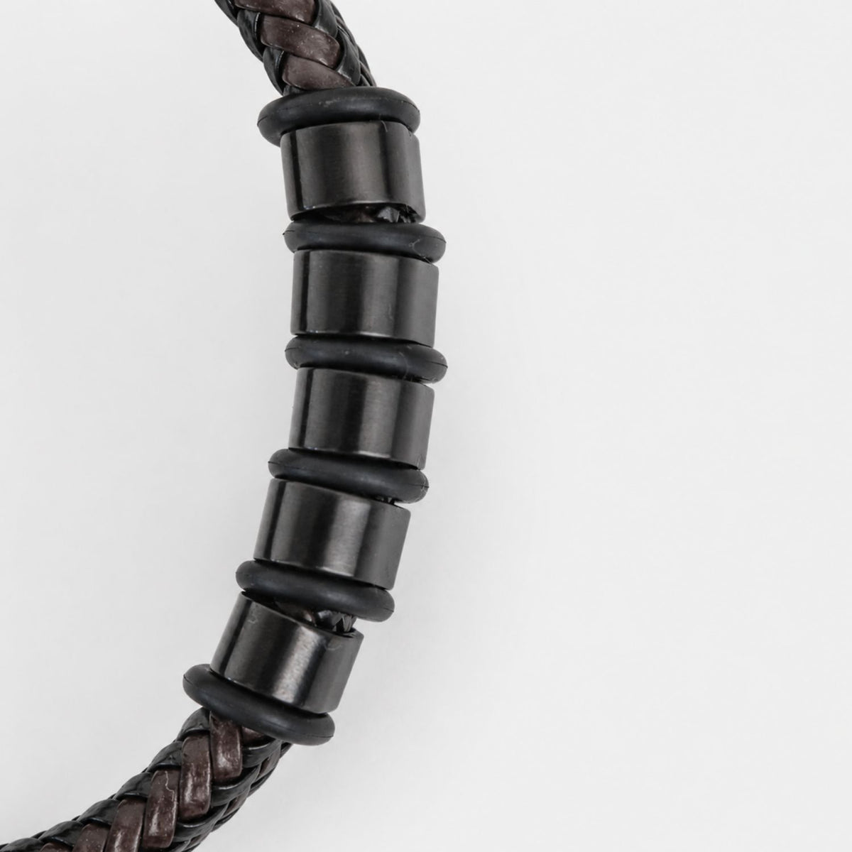 Close-up of engraved beads on bracelet