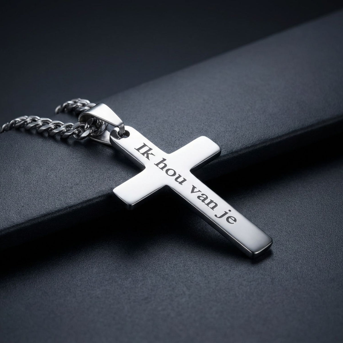 Silver cross necklace pendant close-up detail