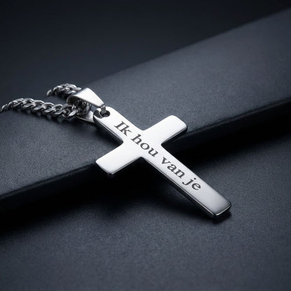Silver cross necklace pendant close-up detail