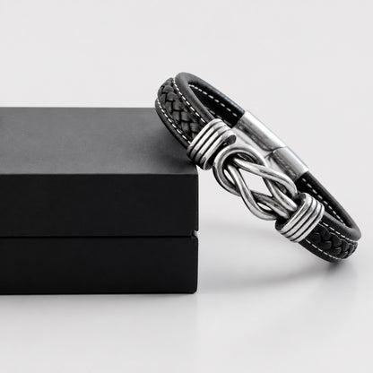 Braided leather infinity bracelet styled on wrist