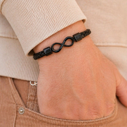Dual name engraving detail on infinity bracelet clasp
